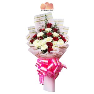 A hand-tied bouquet consists of 12 red roses and 12 white roses wrapped in pink wrapper