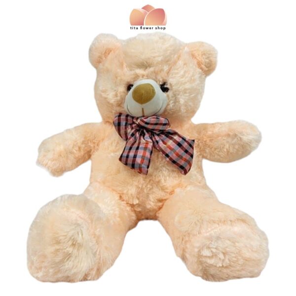 light orange teddy bear stuff toy