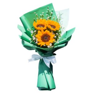 A bouquet of three bright yellow sunflowers accented with white aster fillers and greenery, wrapped in glossy green paper and tied with a white ribbon