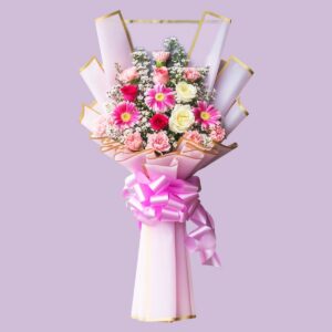 Fresh premium bouquet with carnations, pink roses, white roses, and pastel pink accented wrapping