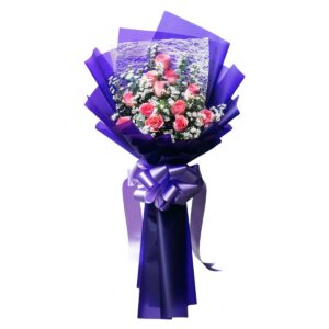 12 pink roses bouquet wrapped in purple wrapper from Bohol flower shop